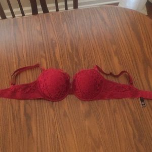 Never worn 34d dark red lace bra. Victoria secret